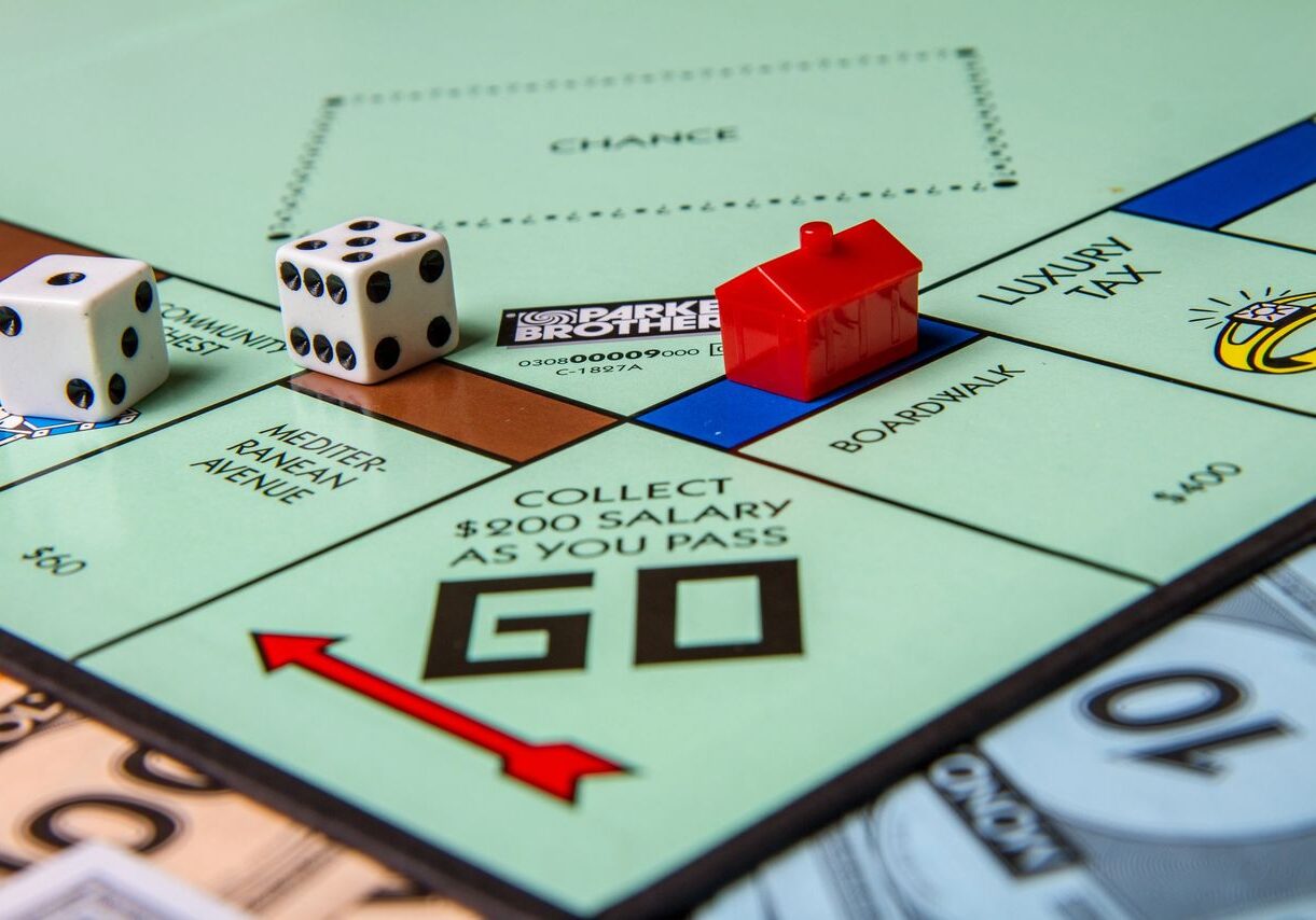 CALDWELL, IDAHO- MARCH 16, 2015: Playing a game of Monopoly from parker brothers SSUCv3H4sIAAAAAAAACpyRy24DIQxF95X6DyPWGYlJMq/+StSFeSSDQiACJlUV5d9rYIhYd4eP7Wtf8/z8aBrCwCtOvppnjDBWWq8+OAjKGsR0t3EnjZCuJg93GGgNpFDBOgUaYVcgg8AXAzeJ0KxaR/xKSeIDhNVLH6dviEOQF9TI8C2RVzzluCmJlMQOTBGyq5hfWWIFZfF/debHd3EDF2n4b1q4MuKklpCNnHIpuf4E6W61NViFspWrh